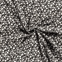 Viscose poplin print bladeren zwart